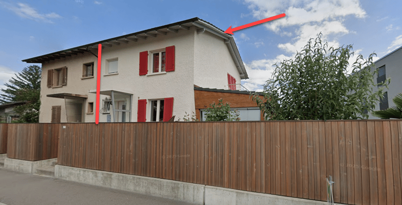two story house, white exterior, red shutters, wooden fencing, roof terrace, raised ground floor