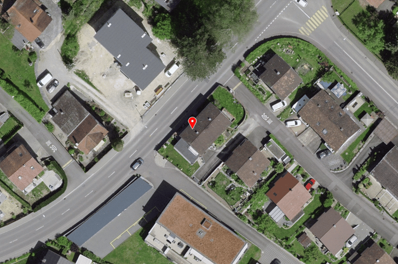 residential area, with several houses and road intersections