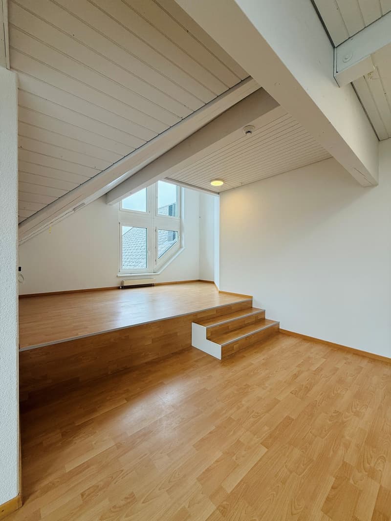 empty room, wooden floor, white walls, window, stairs