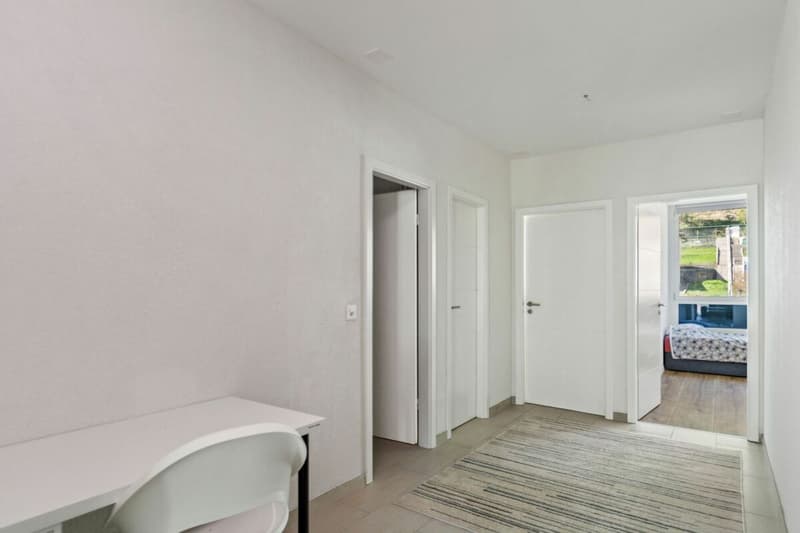 St-Imier, beautiful renovated apartment with 3.5 rooms, balcony, and garage (6)