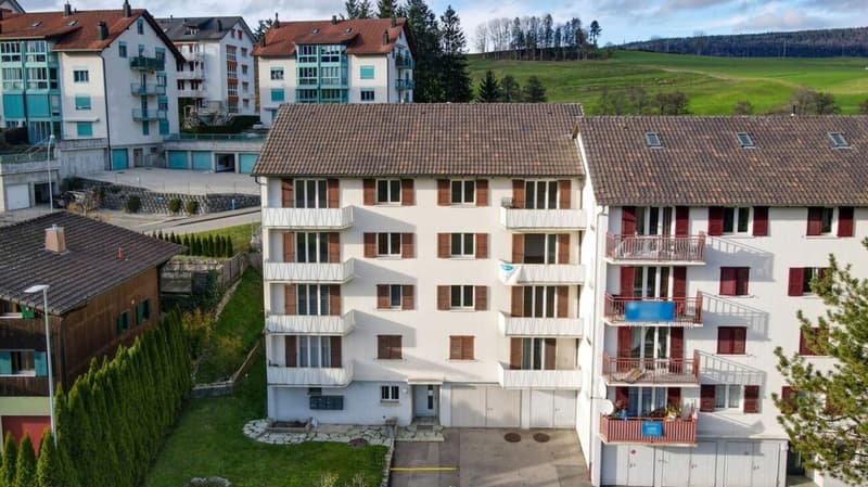 Tavannes, rental building with 8 apartments, 2 garages and 7 parking spaces (1)