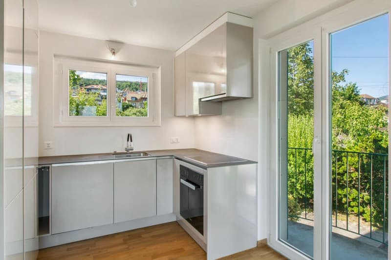 Corcelles, bel appartamento di 3.5 locali con balcone e posto auto (3)