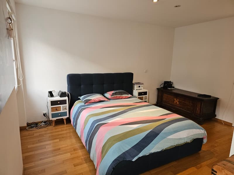 Peaceful living, close to the city in a 4-room apartment with balcony including 1 parking space in Binningen (5)