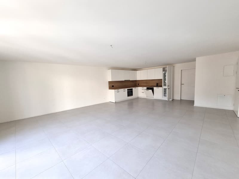 empty room, white tiled floor, white kitchen cabinets, open kitchen