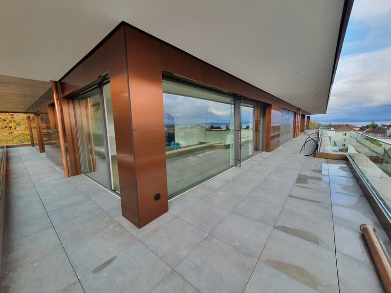 Splendido appartamento in mansarda di 3,5 locali con balcone e vista sul lago (5)