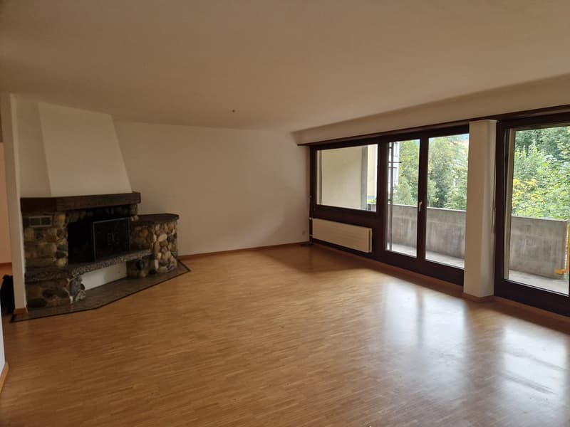 empty room, large windows, fireplace, balcony