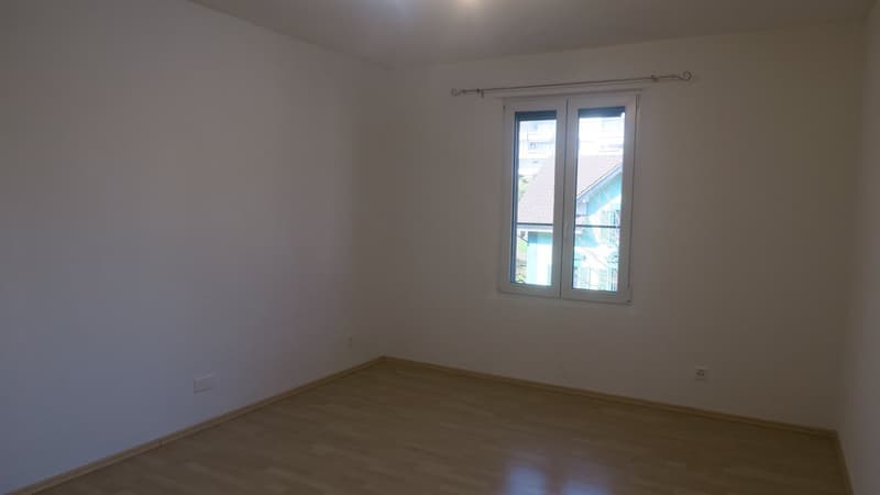 empty room, white walls, wooden floor, window