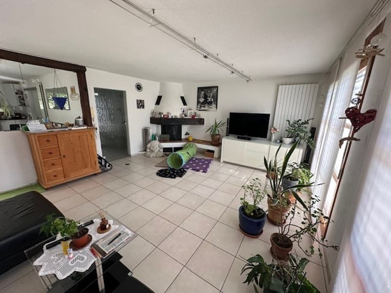Wohnzimmer mit Cheminée