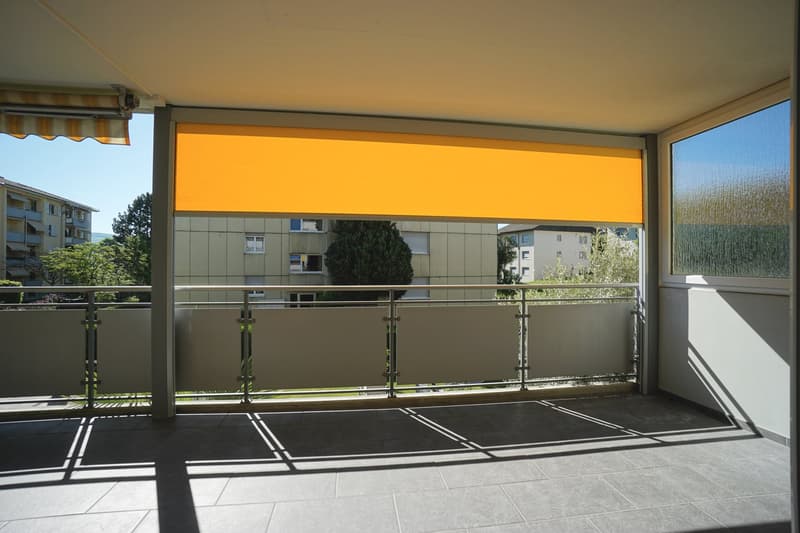 Bel appartement 5.5 pièces au 1er étage avec balcon, local de cave et deux places de parking (13)