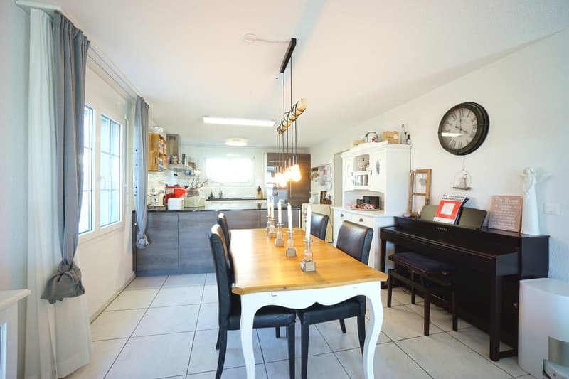 Sunny 5.5-room semi-detached house with spacious garden, hobby room, and garage (10)