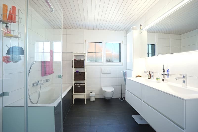 Sunny 5.5-room semi-detached house with spacious garden, hobby room, and garage (20)