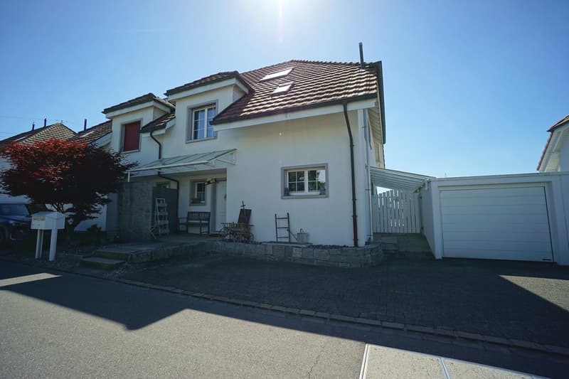 Sunny 5.5-room semi-detached house with spacious garden, hobby room, and garage (29)