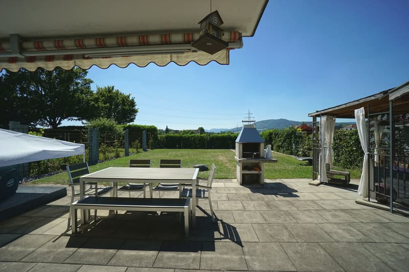 Sunny 5.5-room semi-detached house with spacious garden, hobby room, and garage (5)