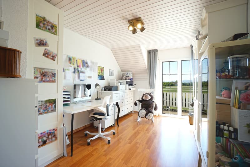 Sunny 5.5-room semi-detached house with spacious garden, hobby room, and garage (16)