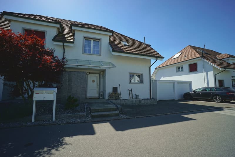 Sunny 5.5-room semi-detached house with spacious garden, hobby room, and garage (28)