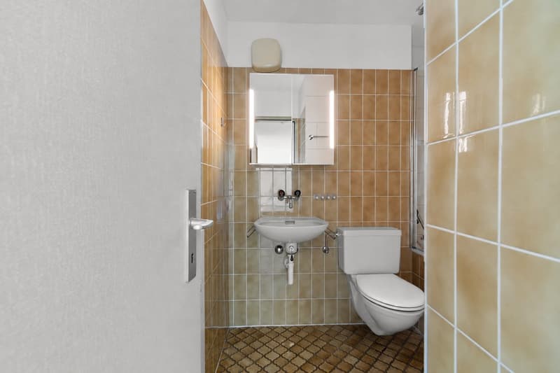 Badezimmer mit Badewanne / Dusche