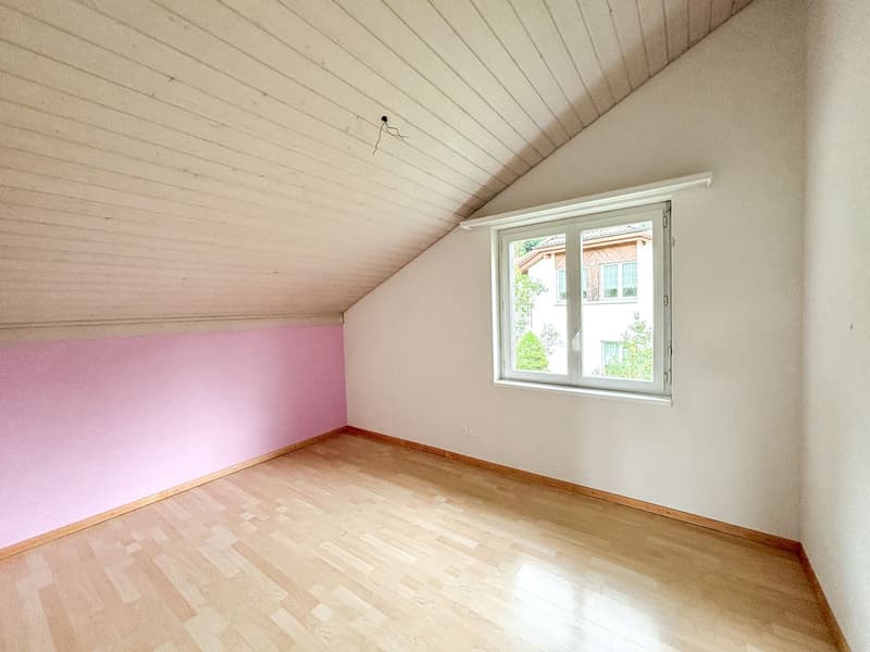 empty room, wooden floor, white and pink walls, window