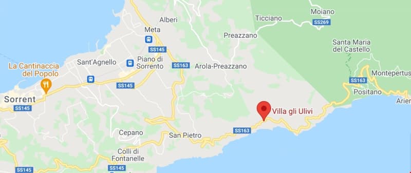 The image shows a map of the Sorrento Peninsula in Italy, with the location of Villa gli Ulivi marked by a red pin. The map indicates the nearby towns of Sorrento, Positano, and Arola-Preazzano, as well as the roads and highways in the area.