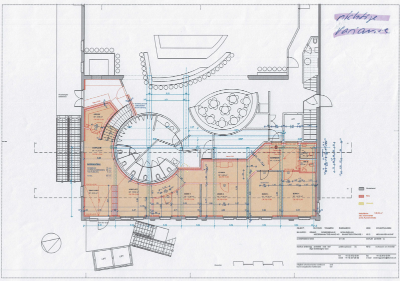 The image shows a detailed floor plan of a building. It includes a large central area with various rooms labeled, such as a living room, kitchen, and multiple bedrooms. There is also a balcony or terrace visible on the plan.