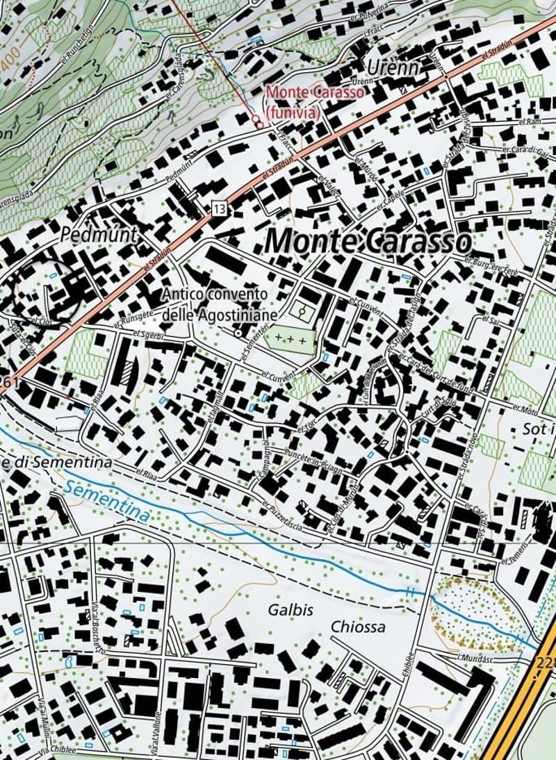 A map detailing the layout of Monte Carasso with key landmarks, streets, and public facilities.