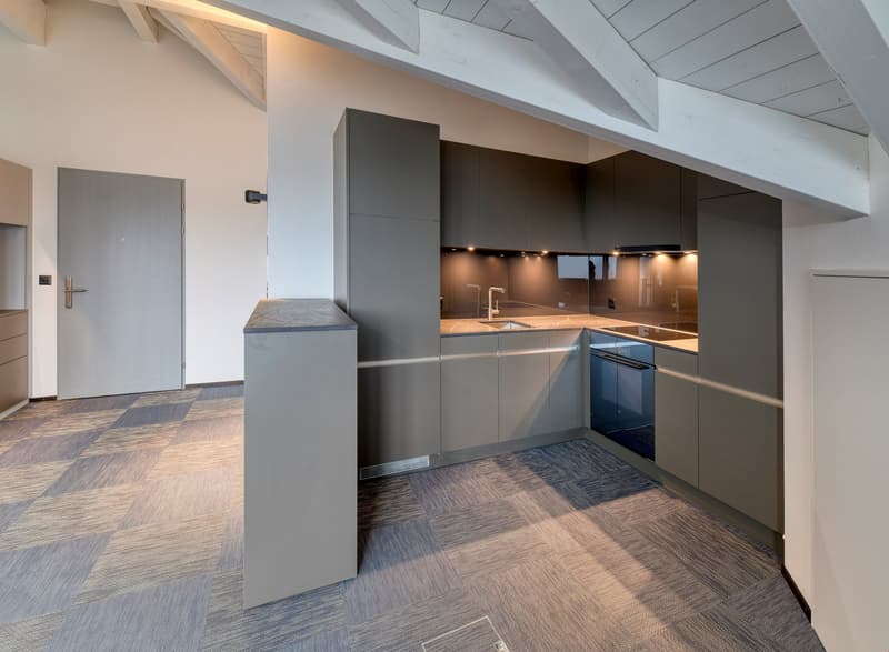 kitchen with modern appliances, grey cupboards, tiled floor, large countertop, faucet, open shelving