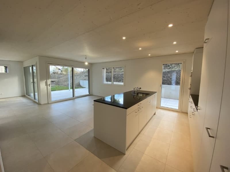 Reserviert Neu Erstbezug 5.5 Einfamilenhaus mit Garten rund ums Haus (6)