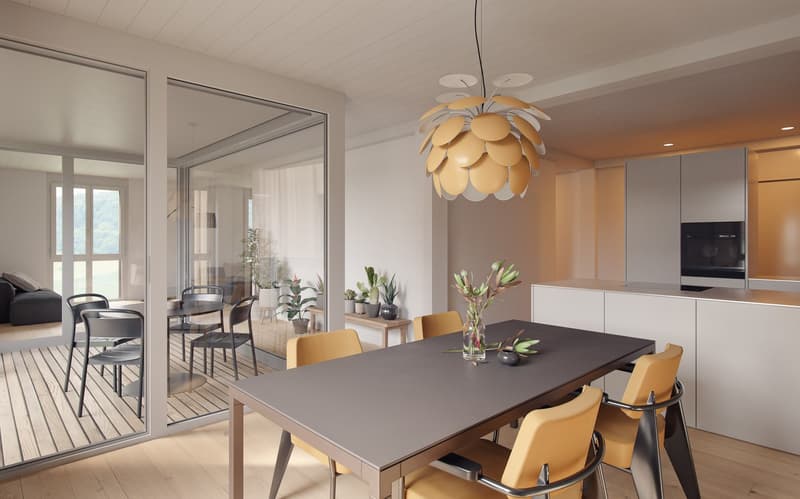 Dining area with a modern grey table and yellow chairs, wooden floor, glass wall with a balcony, plants on a table, pendant light.
