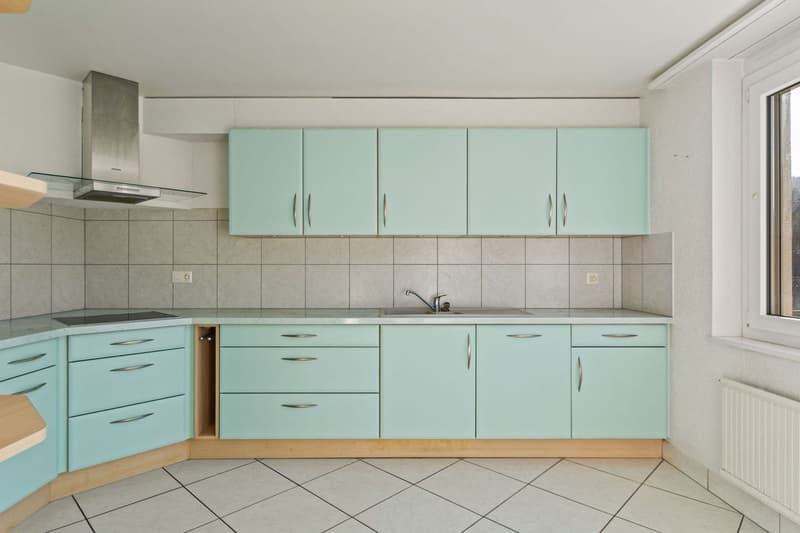 Appartamento di 4.5 locali PPE spazioso e accogliente con balcone, giardino comune e 3 posti auto (7)