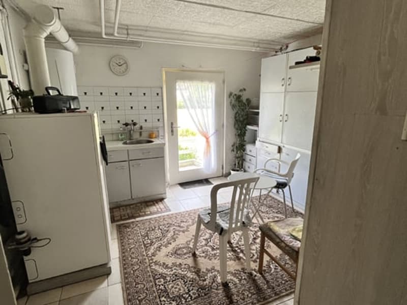 Large building comprising 2 apartments with 5.5 rooms (21)