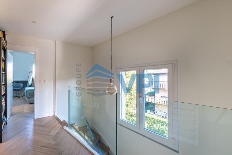 Duplex en attique magnifiquement rénové (4)