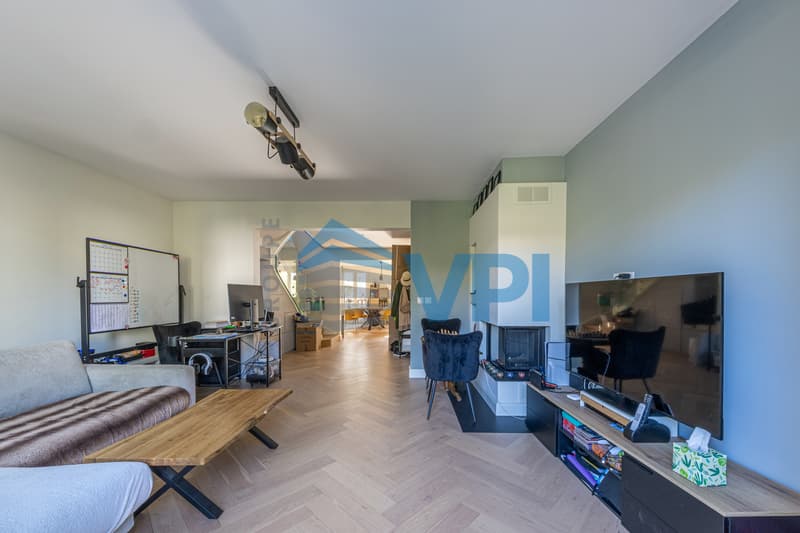 Duplex en attique magnifiquement rénové (3)