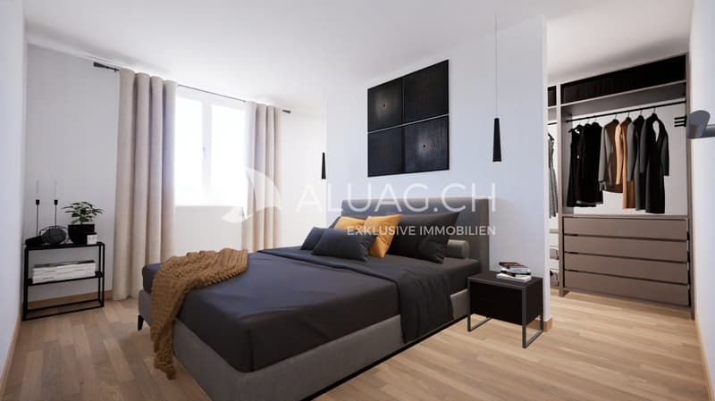Ruhiges Elternschlafzimmer mit eigenem Ankleidezimmer und elegantem Parkett