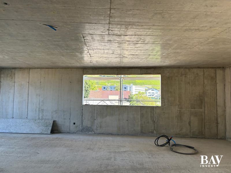 Attic in a 5-apartment building in the heart of the village of Vétroz (11)
