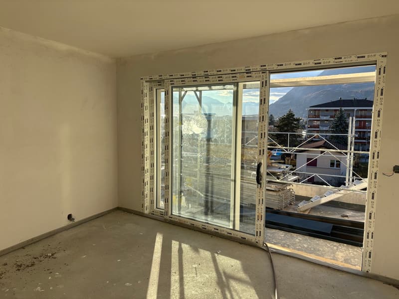 Attic in a 5-apartment building in the heart of the village of Vétroz (12)
