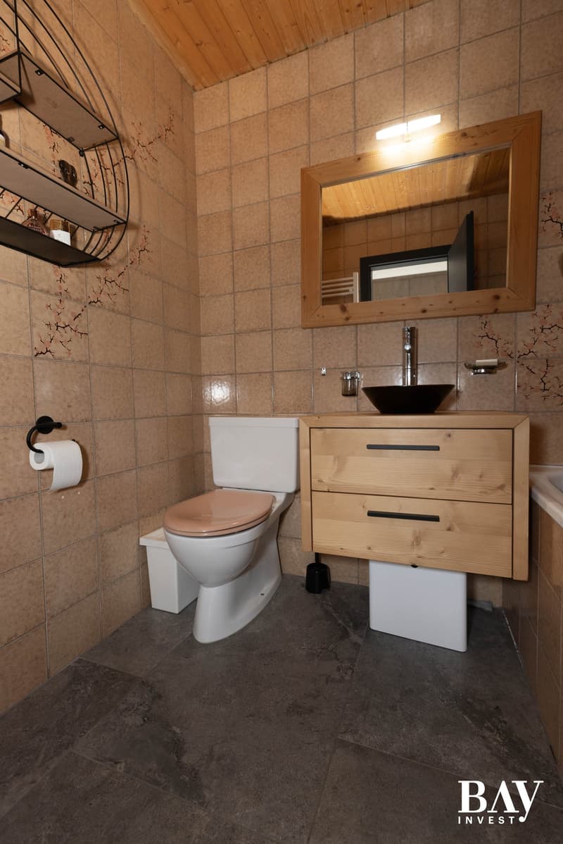 Charming semi-detached house with 3.5 rooms and panoramic views of the mountains (24)