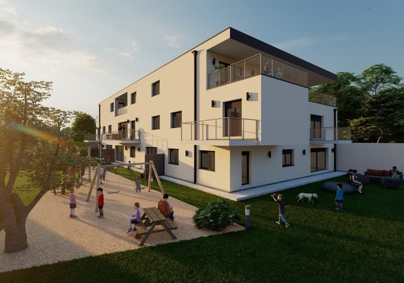 3 story building, white exterior, balconies, outdoor play area with swings, slide, and picnic table, children playing, adults relaxing on outdoor seating