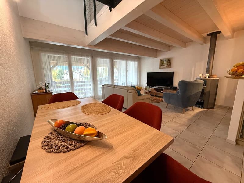 dining table, red chairs, TV, living couch, wooden floor, wooden ceiling