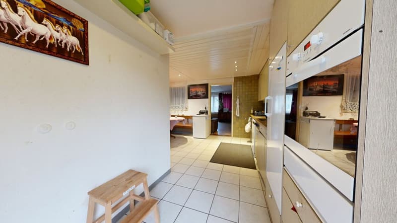 Two-family house with renovation needs and additional building land parcel (4)