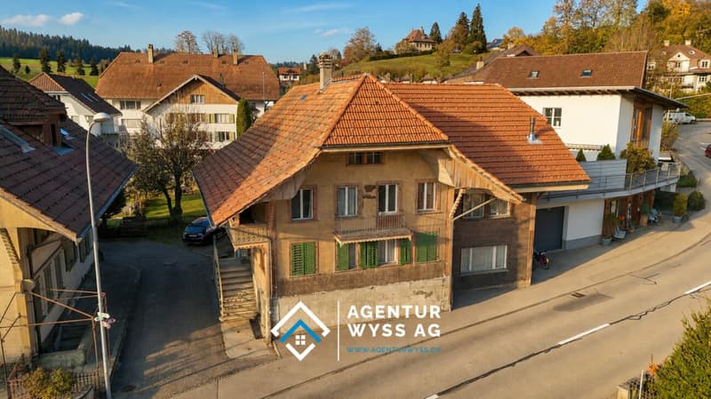 Two-family house with renovation needs and additional building land parcel (1)