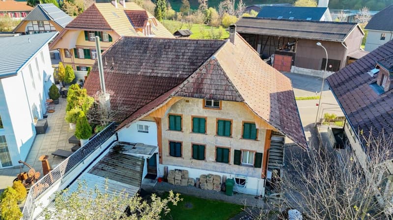 Two-family house with renovation needs and additional building land parcel (2)