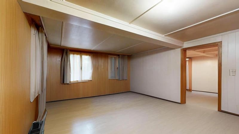 Two-family house with renovation needs and additional building land parcel (8)