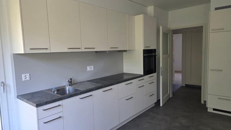 Appartement situé dans un petit immeuble de 3 étages. (1)