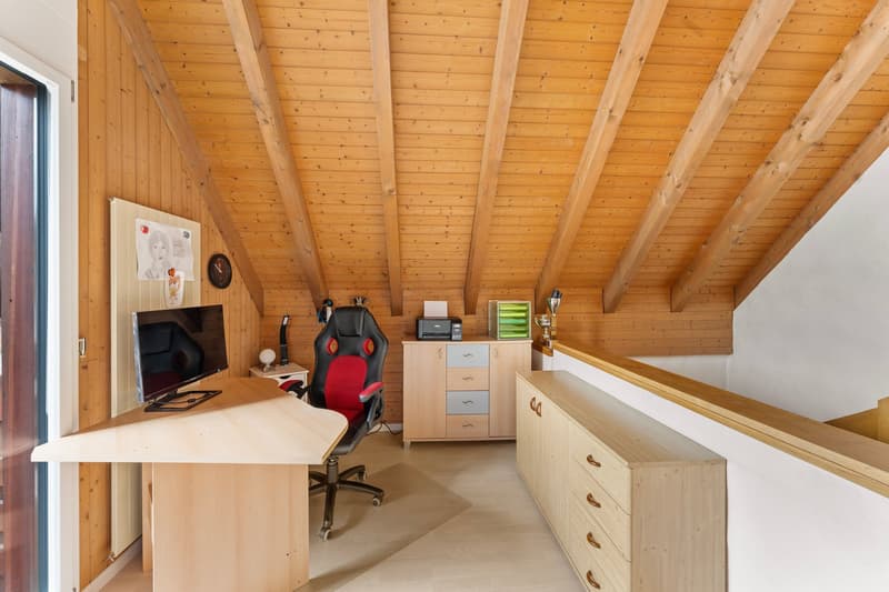 Appartement-maisonnette spacieux 5.5 pièces avec cheminée et vue panoramique (21)