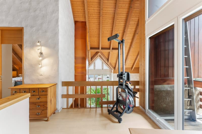 Appartement-maisonnette spacieux 5.5 pièces avec cheminée et vue panoramique (22)