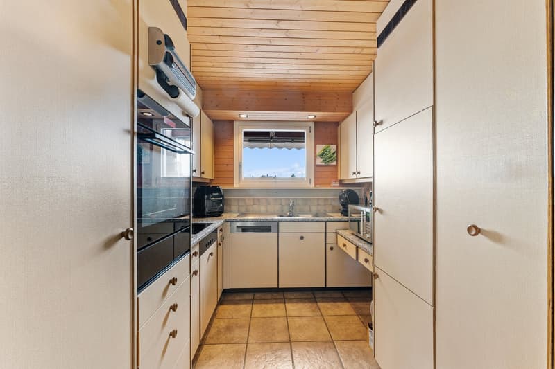 Appartement-maisonnette spacieux 5.5 pièces avec cheminée et vue panoramique (10)