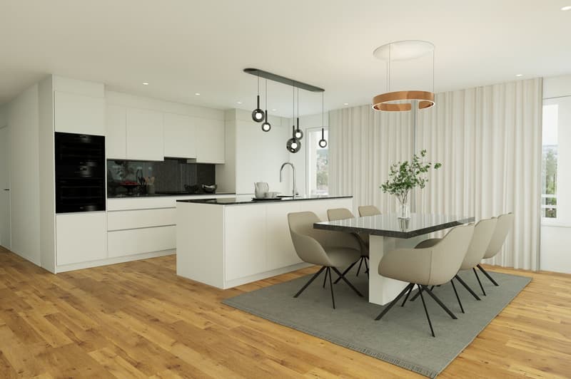 The image shows a modern, open-concept kitchen and dining room. The kitchen features white cabinets, black countertops, and built-in appliances including a dishwasher. The dining area has a large rectangular table with beige chairs. The room has hardwood