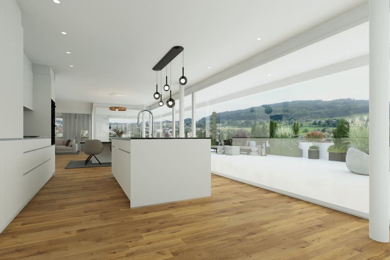 Spacious open-plan living area with hardwood floors, white walls, modern pendant lighting, kitchen island, and large windows offering a scenic view of the surrounding landscape.