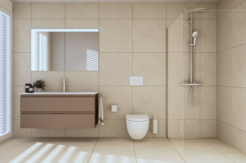 tiled walls and floor, mirror, undermount sink, faucet, vanity, glass-door shower, toilet, roll holder, towel rack