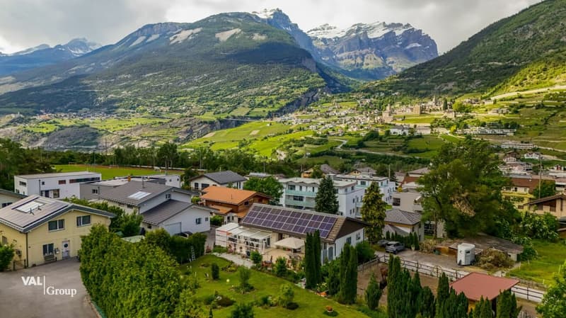 Un foyer pour se sentir bien - avec jardin d'hiver, espace de séjour en plein air et parcelle de construction (33)
