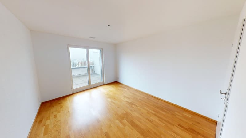 White walls, hardwood floor, sliding glass door, balcony outside